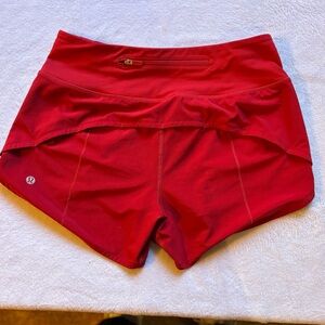 Lululemon red women’s high rise 2.5 inch short